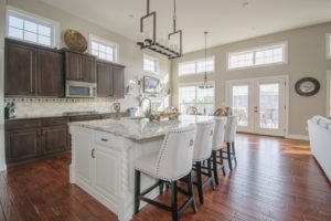 Luxury kitchen interior with granite countertops.