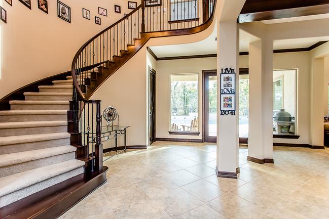 stunning entryway with grand staircase